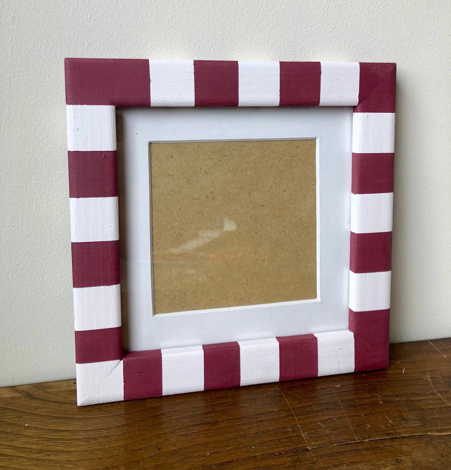 Striped hand-painted frame in pink